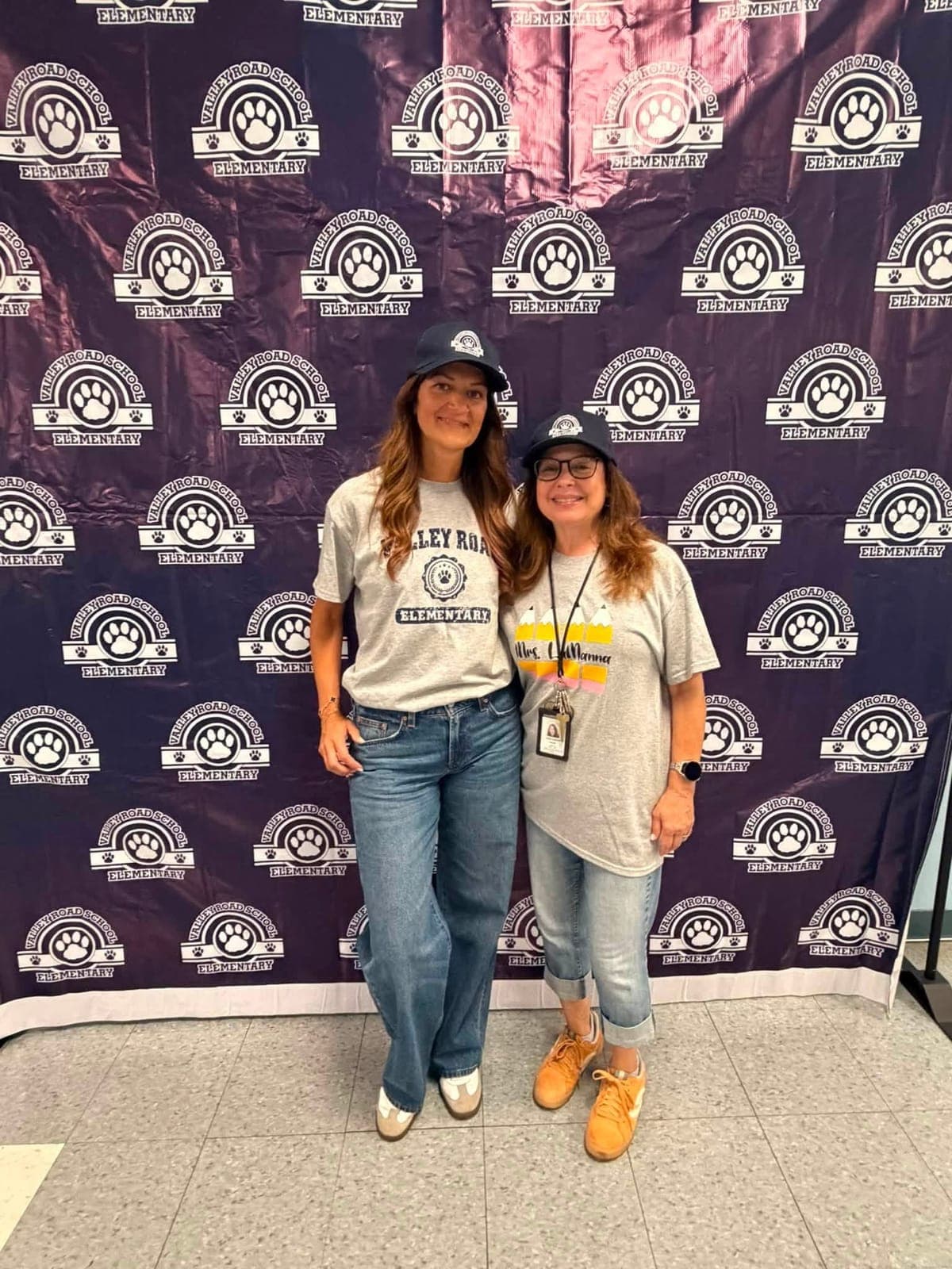 Valley Road School staff members posed at the new photo backdrop during Kindergarten Signing Day.